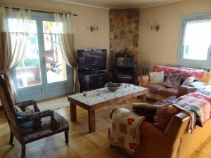 Spanish & British 42 inch tv in communal living area leading to conservatory
