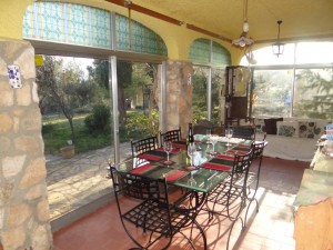 Large Communal conservatory leading to secluded garden